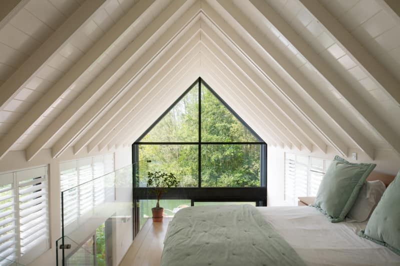 Comfy master bedroom at a Luxury Lakeside Holiday Home in The Cotswolds