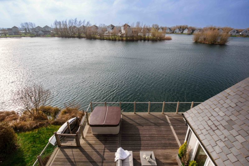 Summer Lake hot tub from the first floor window overlooking the lake
