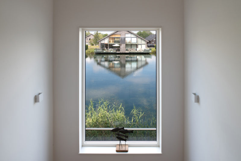 Duck House Stairs window overlooking the lake