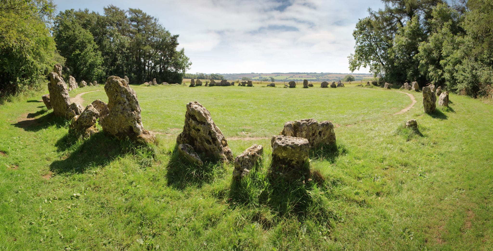 landscape image of the rollright stone in the countryside