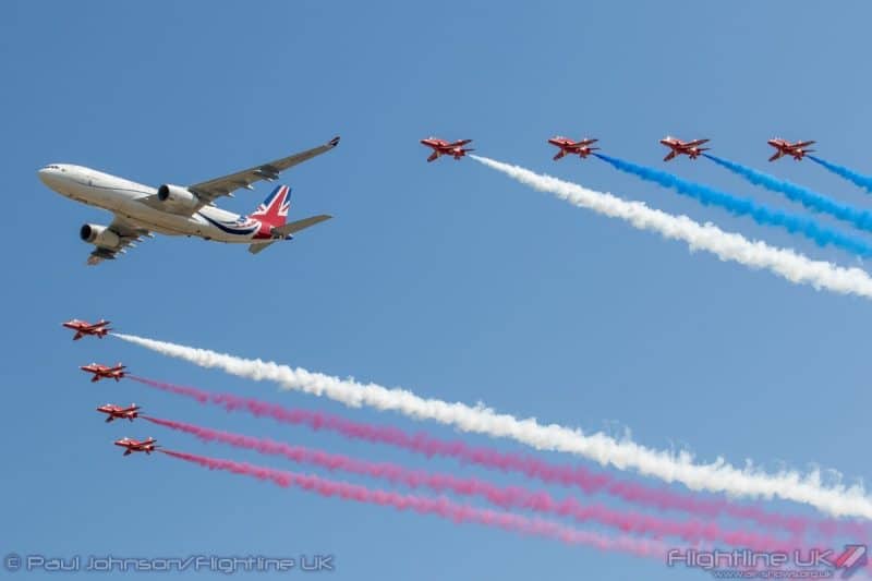 RIAT25 - Red Arrows in formation behind an Airbus