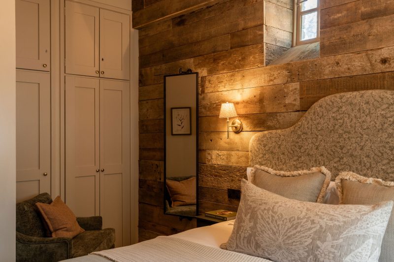 Second bedroom with soft downlighting at White Hart Cottage in the Cotswolds